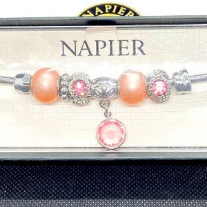 Silver Charm Bracelet w/ 8 sliver and pink charms.